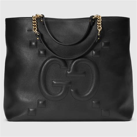 gucci leather shoulder bag embossed print|Gucci embossed leather tote bag.